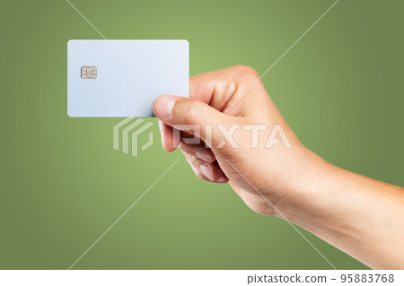 Man's hand holding credit card. 95883768