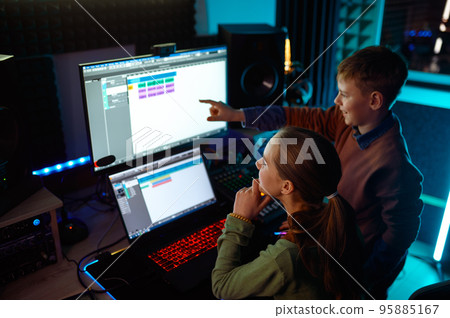 Overhead view on children musician mixing soundtrack Overhead view on children musician mixing soundtrack 95885167