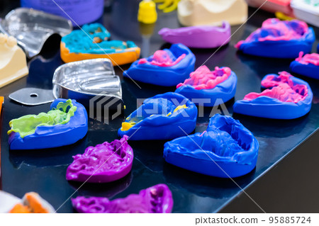 Different dental impressions at medical exhibition Different dental impressions at medical exhibition 95885724
