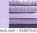 Pile of wool sweaters in trendy colour of the year 2023 digital lavende 95887310