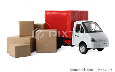 Toy truck with boxes isolated on white. Logistics and wholesale concept Toy truck with boxes isolated on white. Logistics and wholesale concept 95887986