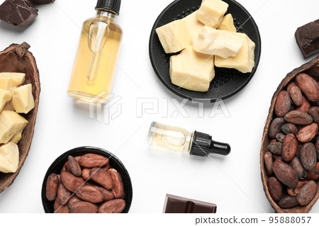 Composition with organic cocoa butter on white background, top view Composition with organic cocoa butter on white background, top view 95888057