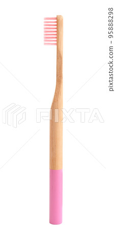 Bamboo toothbrush with pink bristle isolated on white 95888298