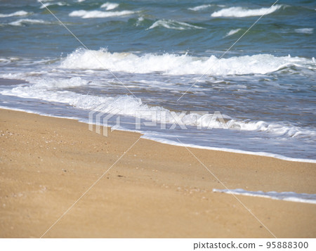Beach and sandy beach with whitecaps. Beach and sandy beach with whitecaps. 95888300