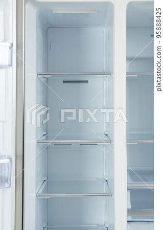 Shelves of empty modern refrigerator, closeup view Shelves of empty modern refrigerator, closeup view 95888425