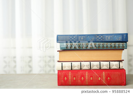 Collection of different books on table indoors. Space for text Collection of different books on table indoors. Space for text 95888524