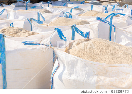 Bags of building mix at hardware store warehouse Bags of building mix at hardware store warehouse 95889773