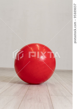 isolated red ball body lifestyle fitness background yoga gym healthy rubber leisure 95889837