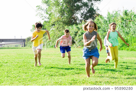 Boys and girls running Boys and girls running 95890280