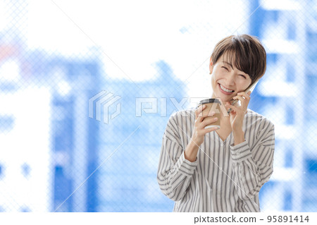woman talking on smartphone woman talking on smartphone 95891414