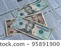 English newspaper and bills (20 dollar bills, 10,000 yen bills) 95891900