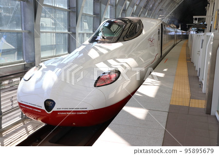 Nishikyushu Shinkansen N700S series stopping at Nagasaki Station 95895679