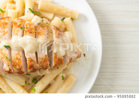 quadrotto penne pasta white creamy sauce with grilled chicken 95895882
