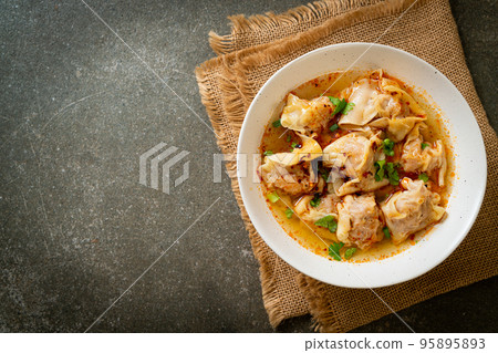 pork wonton soup or pork dumplings soup with roasted chili 95895893