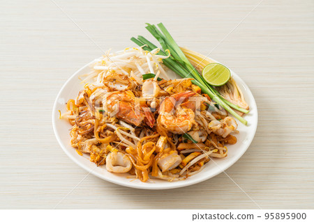 Pad Thai Seafood - Stir fried noodles with shrimps, squid or octopus and tofu 95895900