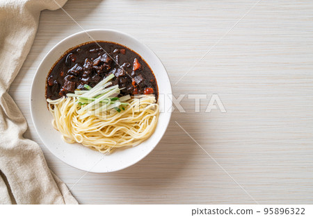 Jajangmyeon or JJajangmyeon is Korean Noodle with Black Sauce 95896322
