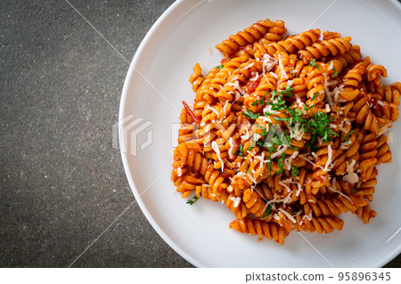 spirali or spiral pasta with tomato sauce spirali or spiral pasta with tomato sauce 95896345