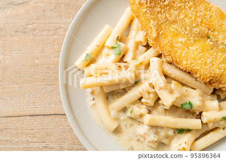 quadrotto penne pasta white cream sauce with fried fish 95896364