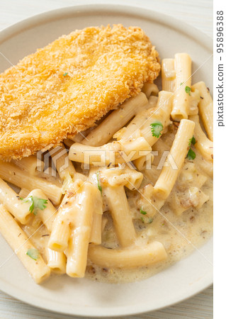 quadrotto penne pasta white cream sauce with fried fish 95896388