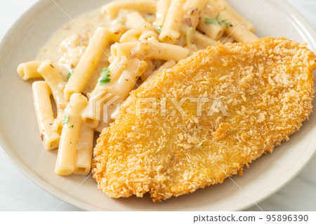 quadrotto penne pasta white cream sauce with fried fish 95896390
