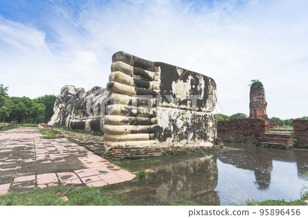 Reclining Buddha statue at Wat Lokayasutharam. Reclining Buddha statue at Wat Lokayasutharam. 95896456