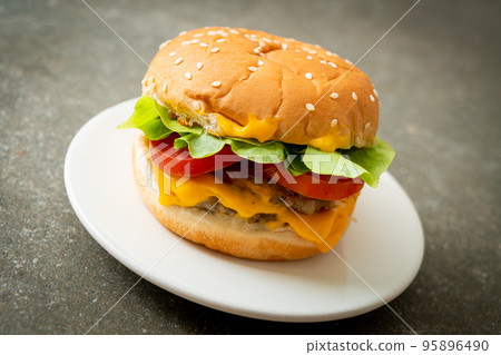 pork burger with cheese on plate pork burger with cheese on plate 95896490