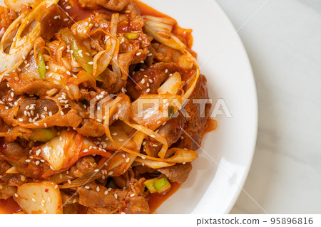 stir-fried pork with Korean spicy paste and kimchi stir-fried pork with Korean spicy paste and kimchi 95896816