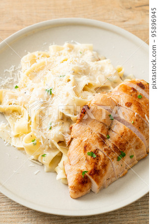fettucine pasta white creamy sauce with grilled chicken fettucine pasta white creamy sauce with grilled chicken 95896945