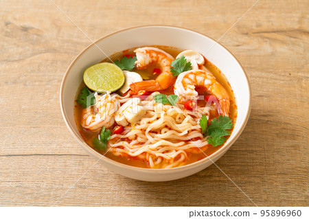 instant noodles ramen in spicy soup with shrimps (Tom Yum Kung) 95896960
