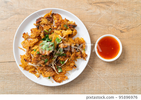 Crispy fried mussel pancake with egg Crispy fried mussel pancake with egg 95896976
