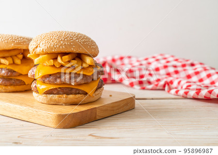 pork burger with cheese and french fries pork burger with cheese and french fries 95896987