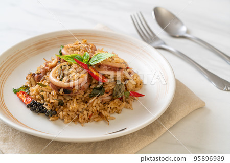Basil and Spicy Herb Fried Rice with Squid or Octopus Basil and Spicy Herb Fried Rice with Squid or Octopus 95896989