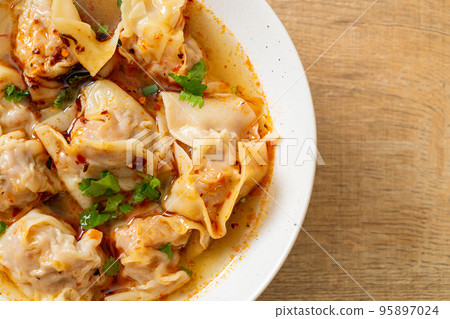 pork wonton soup or pork dumplings soup with roasted chili 95897024