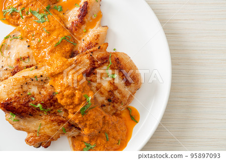 grilled chicken steak with red curry sauce grilled chicken steak with red curry sauce 95897093