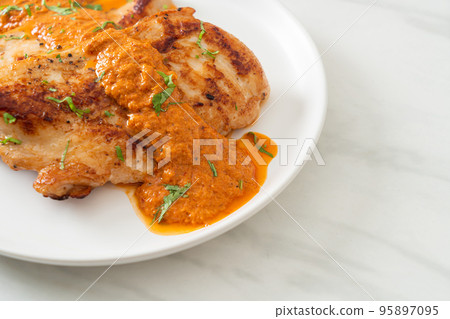 grilled chicken steak with red curry sauce grilled chicken steak with red curry sauce 95897095