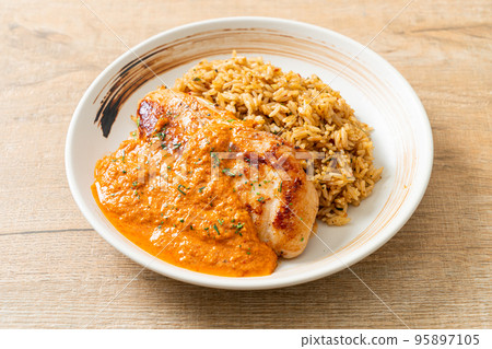 grilled chicken steak with red curry sauce and rice 95897105
