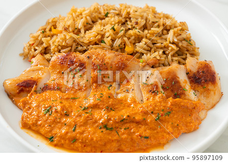 grilled chicken steak with red curry sauce and rice grilled chicken steak with red curry sauce and rice 95897109