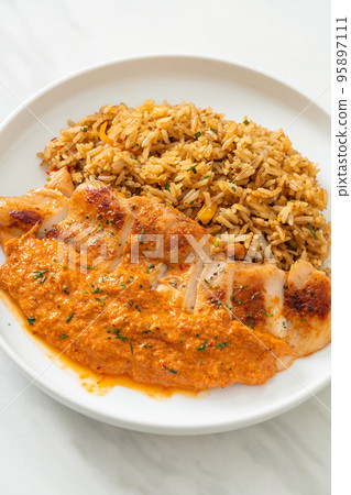 grilled chicken steak with red curry sauce and rice grilled chicken steak with red curry sauce and rice 95897111