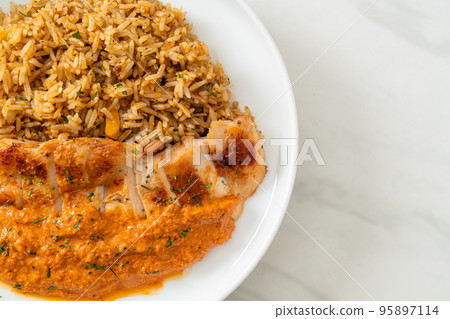 grilled chicken steak with red curry sauce and rice grilled chicken steak with red curry sauce and rice 95897114