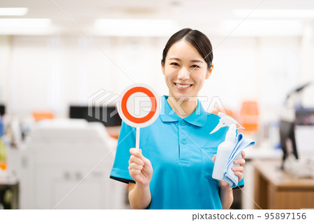 Young female cleaner Stock Photo by ©belchonock 152147058