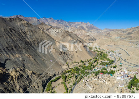 Aerial view of Lamayuru village and Lamayuru Monastery or Gompa is a tibetan style buddhist monastery in Ladakh, north India Aerial view of Lamayuru village and Lamayuru Monastery or Gompa is a tibetan style buddhist monastery in Ladakh, north India 95897673