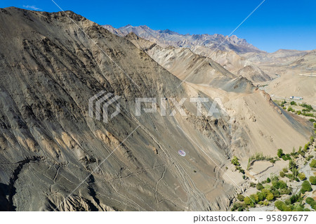 Aerial view of Lamayuru village and Lamayuru Monastery or Gompa is a tibetan style buddhist monastery in Ladakh, north India Aerial view of Lamayuru village and Lamayuru Monastery or Gompa is a tibetan style buddhist monastery in Ladakh, north India 95897677