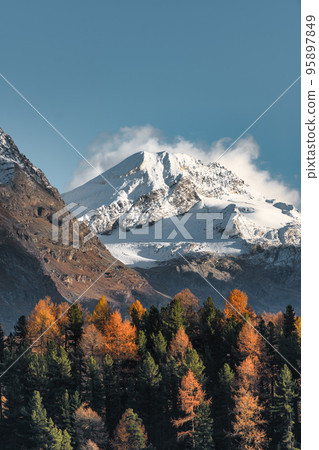 First autumn snowfall on high peaks 95897849