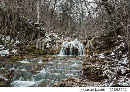Cascades of Djur-Djur waterfall on Ulu-Uzen river in early spring. Khapkhalskiy canyon in Crimea 95898222