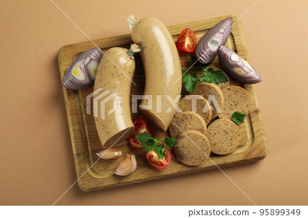 Concept of tasty food with liverwurst sausage, top view Concept of tasty food with liverwurst sausage, top view 95899349
