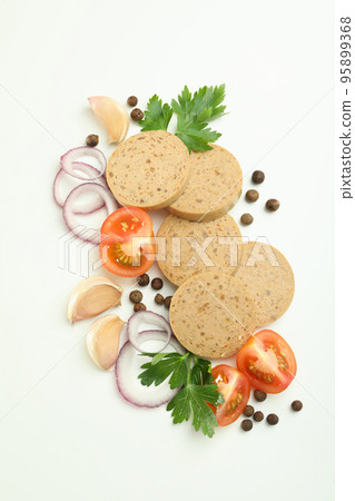 Concept of tasty food with liverwurst sausage on white background Concept of tasty food with liverwurst sausage on white background 95899368