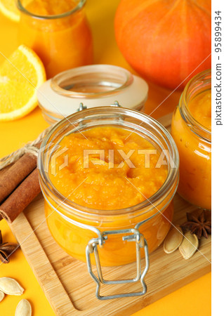 Concept of tasty food, pumpkin jam, close up Concept of tasty food, pumpkin jam, close up 95899434