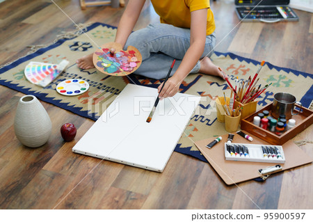 Portrait of an Asian woman designing art in her spare time 95900597