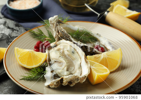 Concept of delicious seafood, oysters, close up Concept of delicious seafood, oysters, close up 95901068