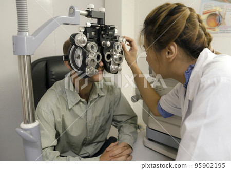 Eye exam, ophthalmologist, eye health. Eye exam, ophthalmologist, eye health. 95902195